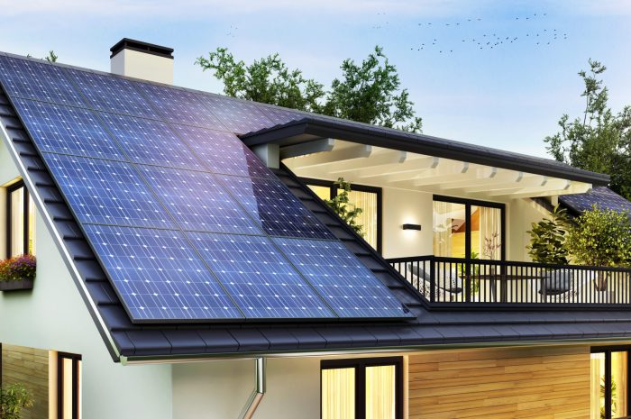 Solar panels on the gable roof of a beautiful modern home